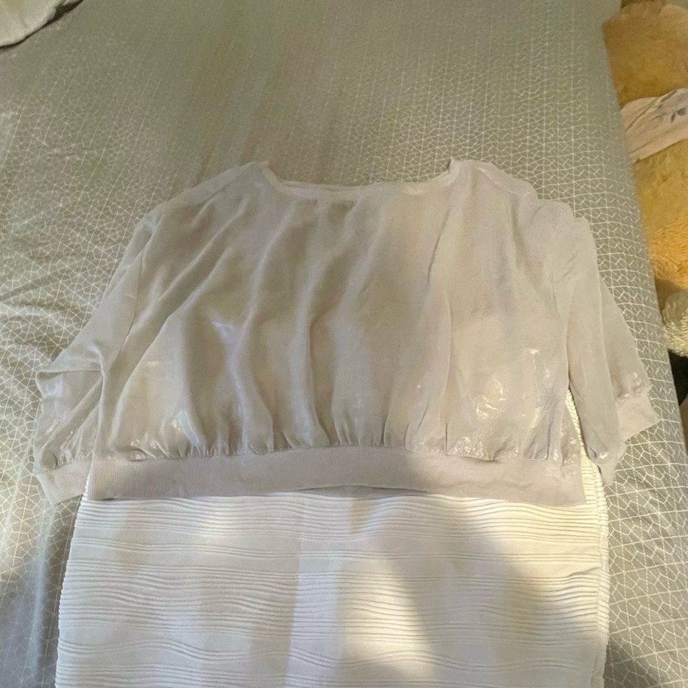 Jennifer Lopez XL crop top and skirt.